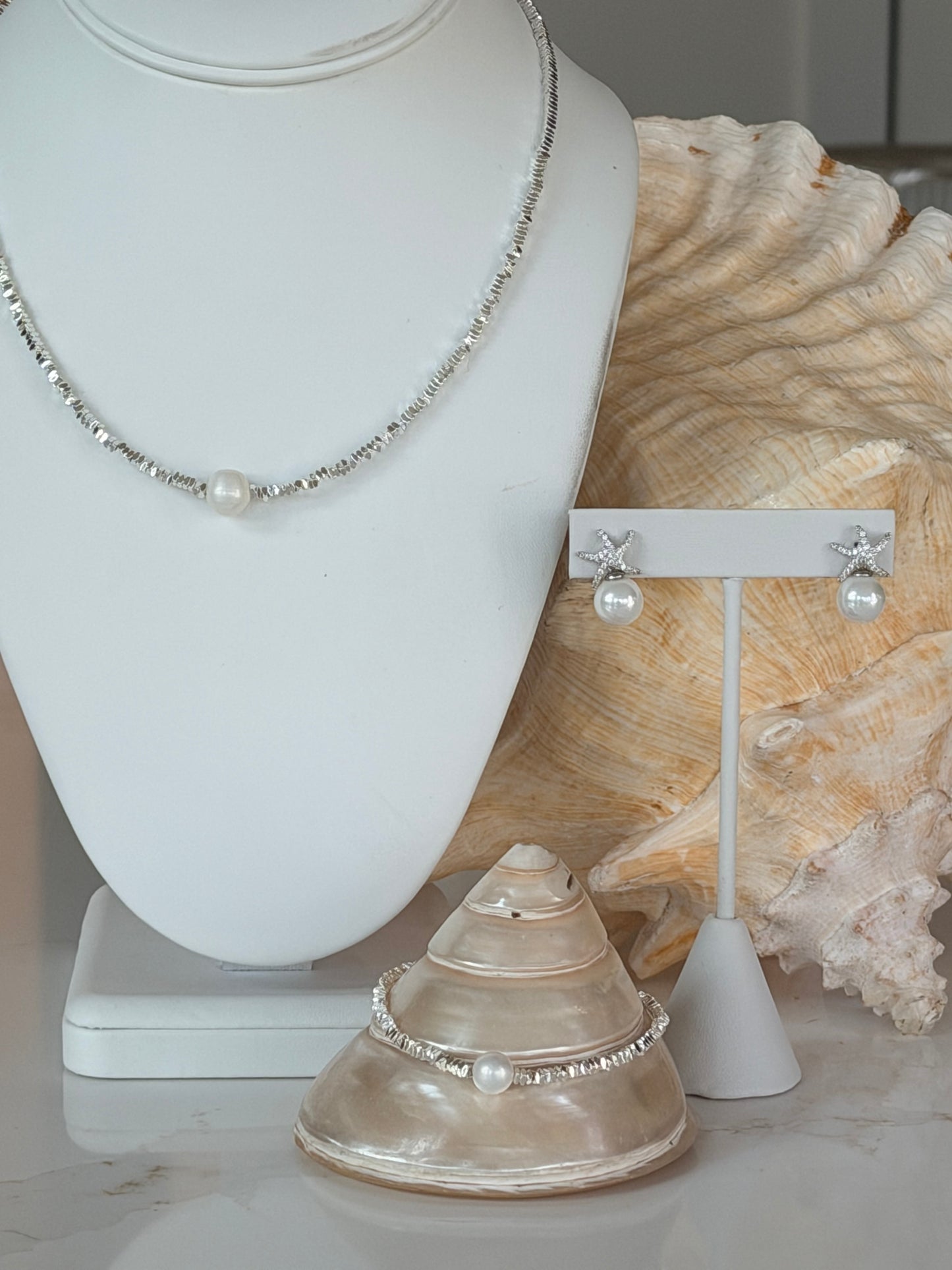 Stacked Bar w Pearl Necklace